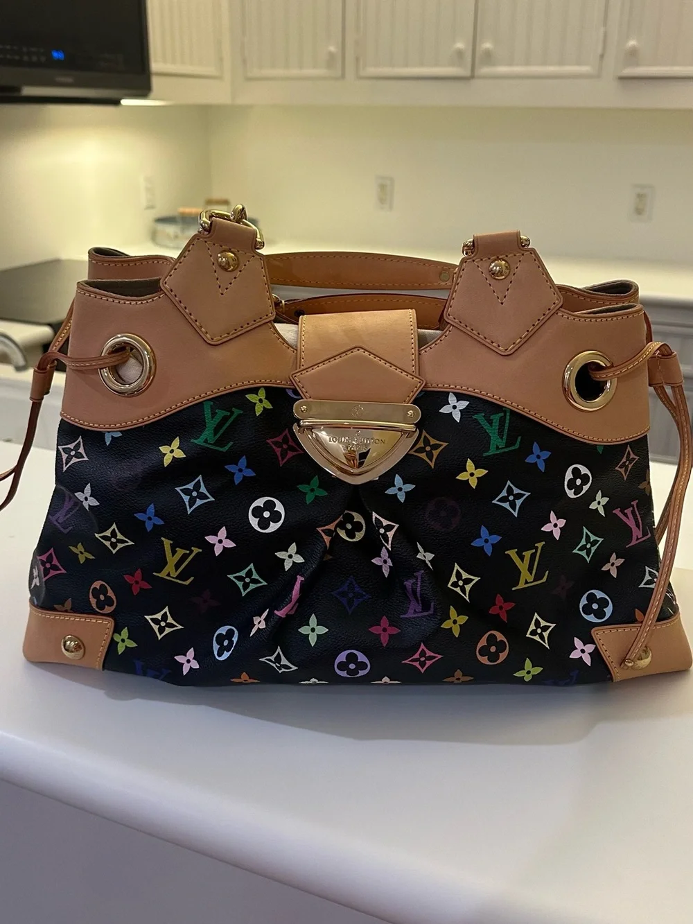 Louis Vuitton Limited Edition Light Beige Suede Interior- Classic Embossed Logo